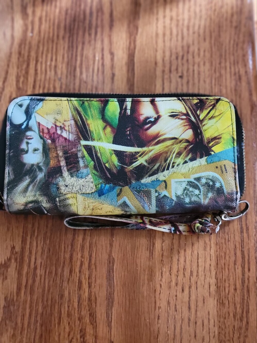 Colorful, Faux Leather Wristlet Featuring a Collage Of Women And Map, Zip Close